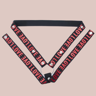 The pink version of the 3 Way Restraining Belt, the LOVE lettering has a shine effect that almost makes it sparkle.