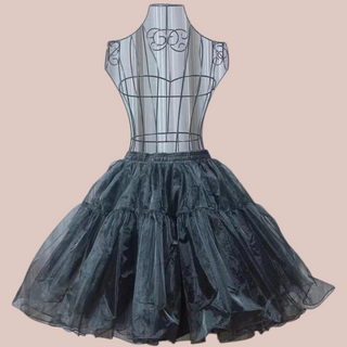 The 5 layer petticoat is made from a stiff fabric which is soft against the skin but is perfect under full skirted dresses and is shown here in black