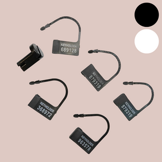 An image of the air lock pin and tags, they are shown here in black, but are also available in white.