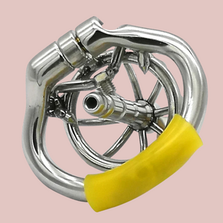 A rear view of the Bird Cage Hinged Urethral chastity cage with the anti-shedding ring fixed in place.