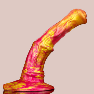 The pink/gold horse dildo from house of chastity, shown is the realistic shape and the base colour, gold variation that makes for a stunning resulting dildo. Also shown is the firmness of the shaft but its ability to bend.