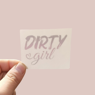 An image of the Dirty Girl tattoo it is shown with its protective cover still on. The colouring is much brighter than this image.