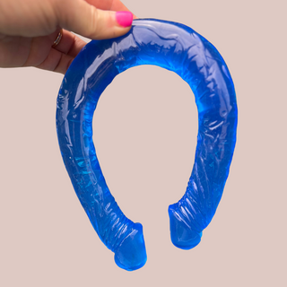 The blue double ended dildo from House of Chastity, it is very bendable and has veins running through the full length.