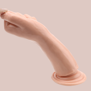 The flesh coloured 8" Fist Dildo from House Of Chastity, you can see it being angled to show that it is easy to manoeuvre