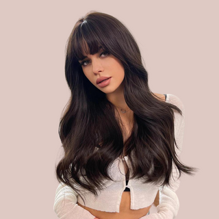 The dark brown long length wig from House Of Chastity is shown being modelled. It can be dressed up or down for day or night wear.