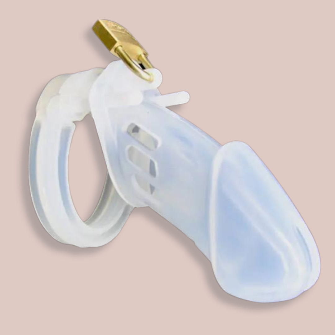 The clear silicone chastity cage shown close up , you can see it assembled and with its external padlock in place.