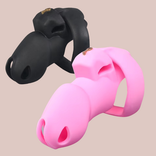 The HT V4 Silicone chastity cages shown in both sizes and colours available. The black cage is a small size and the pink cage is a standard size.