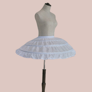 A angled view of the hoop petticoat modelled on a mannequin