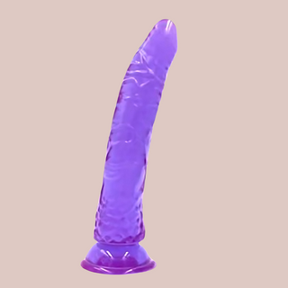 See through purple jelly style large dildo with sucker base.