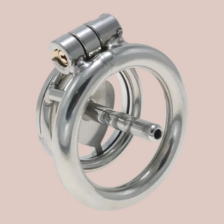 A rear view of the Lock My Heart chastity cage, you can see that it is fully assembled and the urethral tube running from the centre.