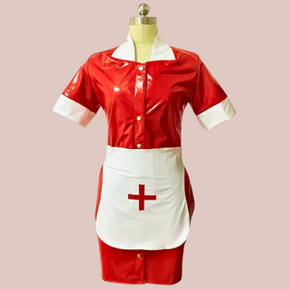 The nurse outfit from House Of Chastiyt, a red wet look dress with white collar and sleeves and a matching white apron with a red cross on the front.