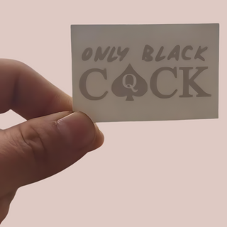 A close up of the Only Black Cock temporary tattoo as it comes on its packaging, it has been flipped to show how it will read on the skin.