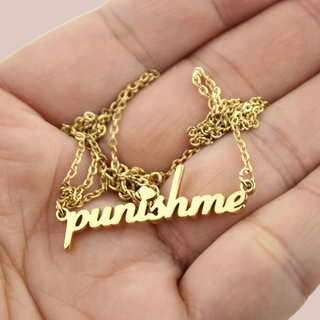 The punishme necklace and chain shown in the palm of the hand.