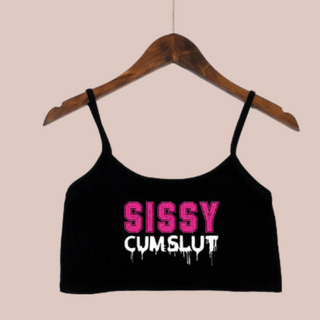 The Sissy Cumslut camisole top shown here on a hanger. You can see the thin black straps and large lettering.