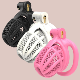 The black, pink  and white versions of The Hive from House Of Chastity are shown from a side view fully assembled. You can see the close up of the hole design that runs throughout the cage.