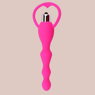 Bright pink beaded anal sex toy shown with width dimensions ranging from 5.9 cm at the widest point, to 1.7 cm at the narrowest point.