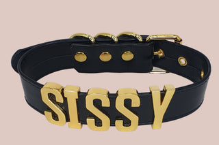 The black sissy collar with gold lettering